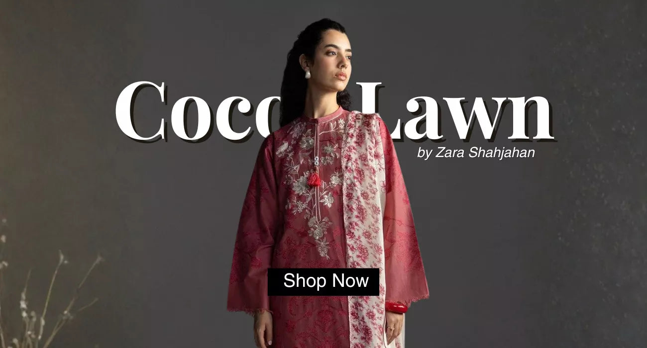 Pakistani Woman wearing a pink and white floral outfit with 'Coco Lawn by Zara Shahjahan' branding on a dark background.