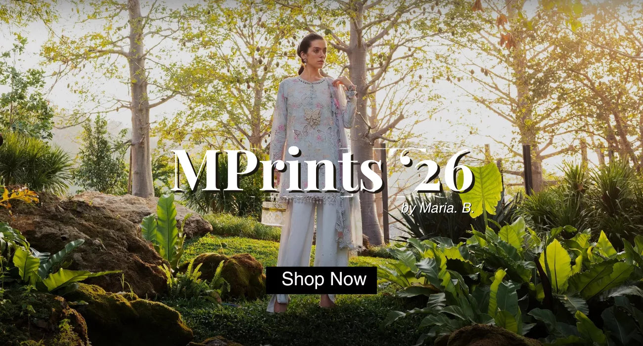 Woman standing in a garden wearing MPrints 26 by Maria B